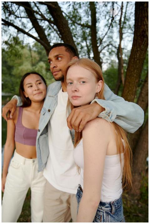 Three young friends enjoying a moment together out