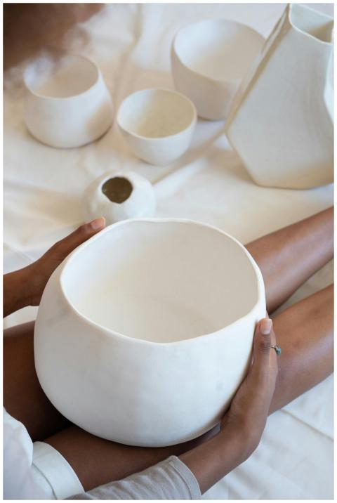 High angle of crop African American artisan sittin