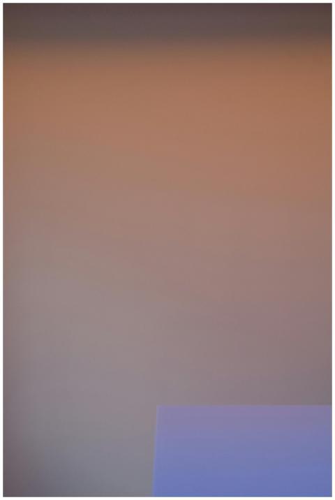 A minimalist abstract image featuring a soft gradi