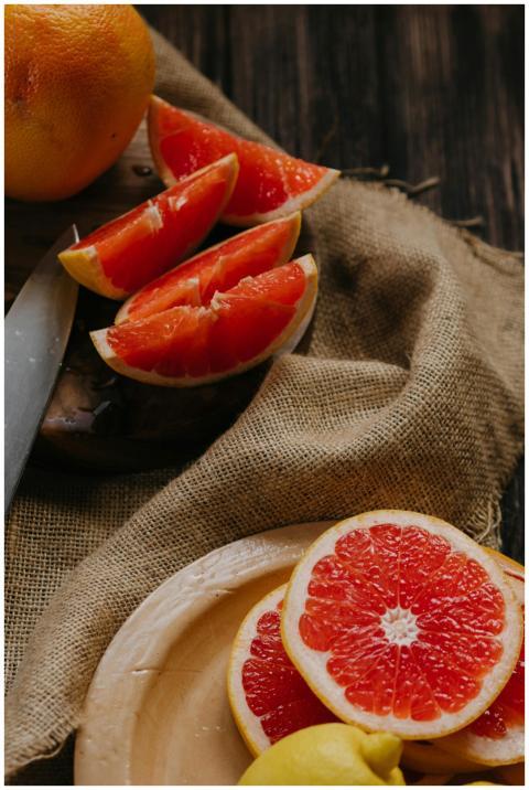 Vibrant sliced grapefruit and lemon arranged on a