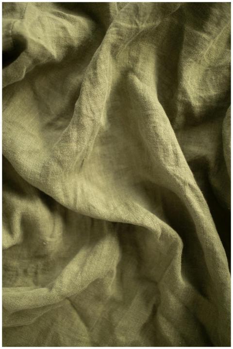 Detailed close-up of wrinkled fabric texture in a