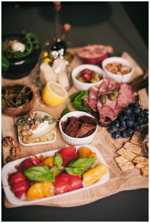 A beautifully arranged charcuterie board featuring
