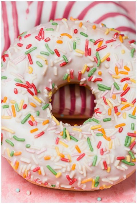 Close-up of a sprinkled donut with vibrant colors