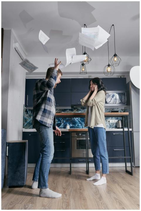 A dramatic scene of a young couple in a heated arg