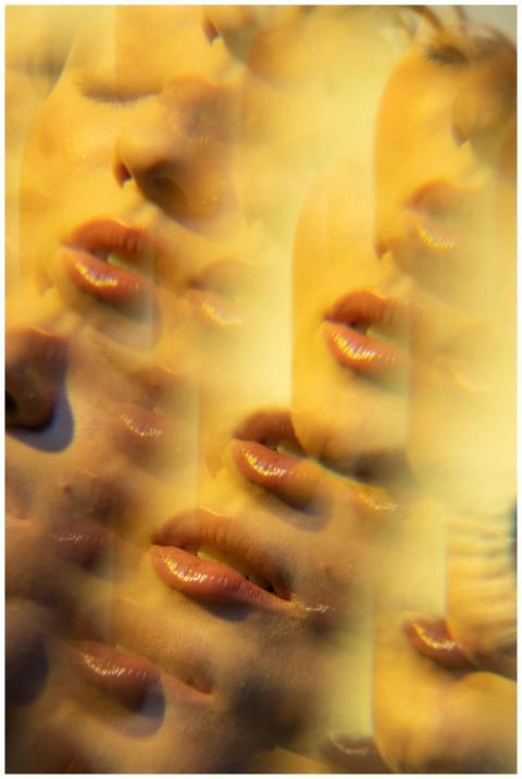 Artistic double exposure of human faces creating a