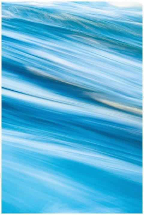 Vibrant abstract motion blur with shades of blue c