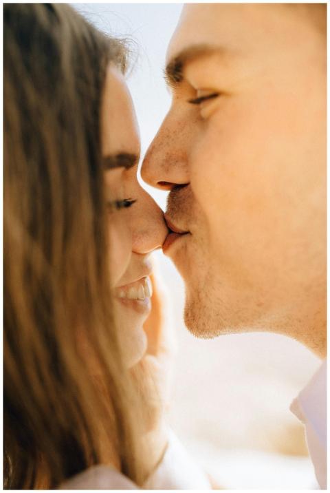 Romantic close-up of a man and woman sharing an in