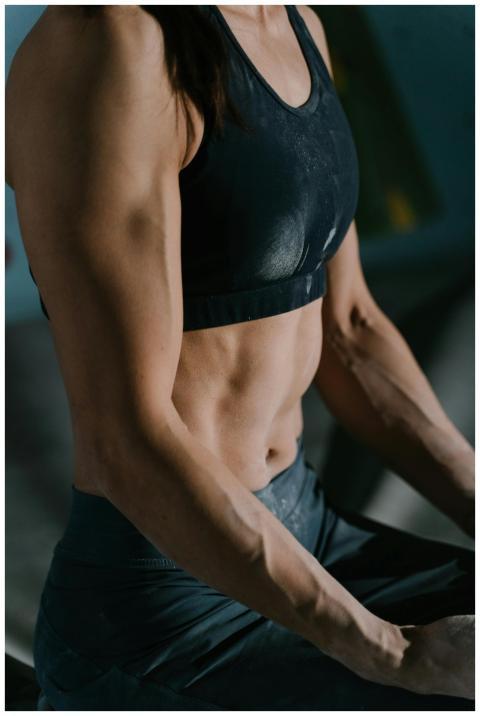 Close-up of a muscular woman resting during an int