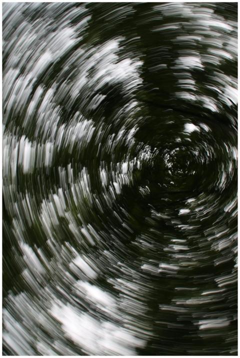 Captivating spiral motion blur of leaves creating