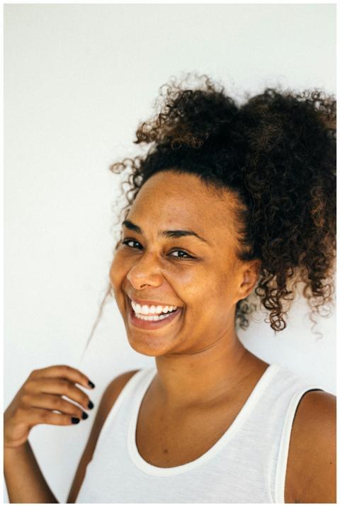 Close-up of a joyful African American woman smilin