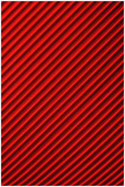 Vibrant diagonal red and black pattern, ideal for