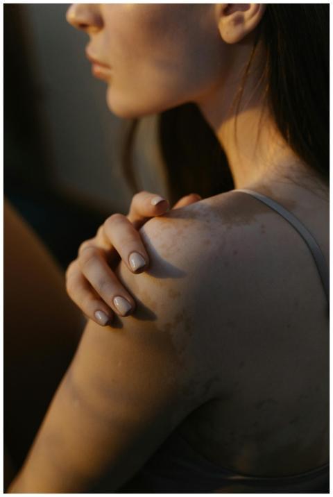 A thoughtful close-up of a woman embracing her uni