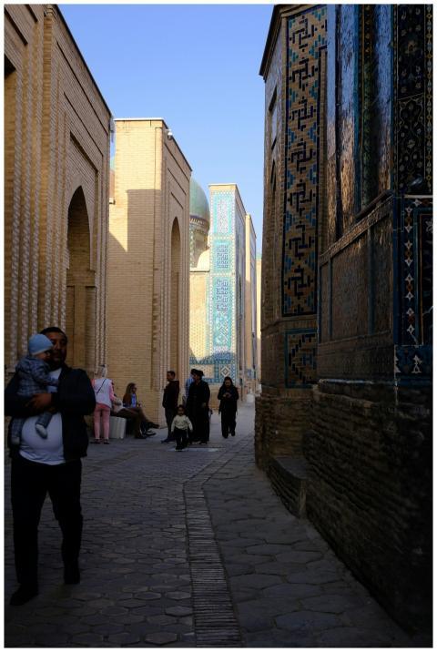 Tourists stroll through ancient Samarkand, showcas