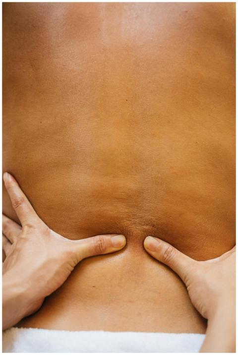 Close-up of hands performing a relaxing massage on