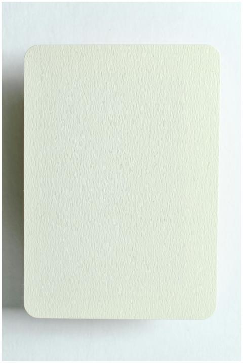 A minimalist blank textured card on a neutral whit