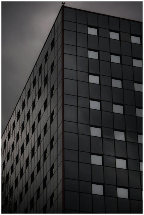 A striking modern skyscraper in Mexico City with a