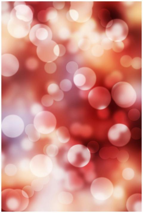 A dynamic red bokeh background with bright circles