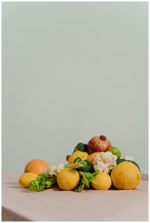 Colorful organic fruits and vegetables arranged on