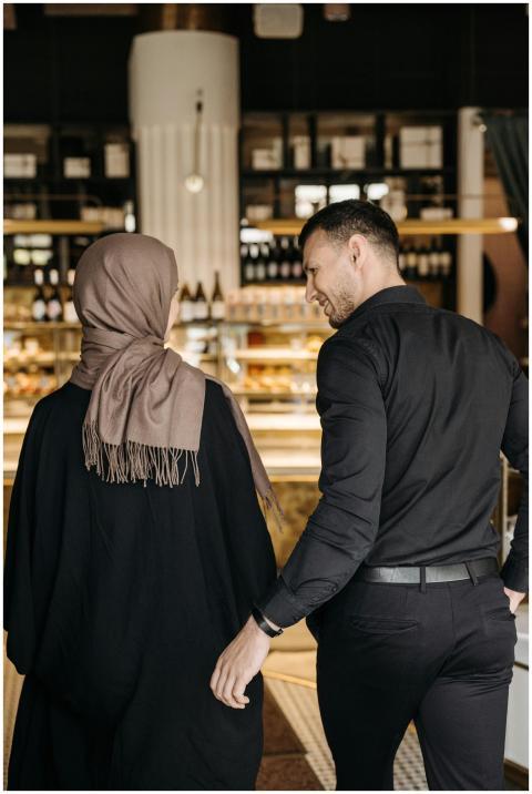 Muslim couple in traditional wear enjoying a visit