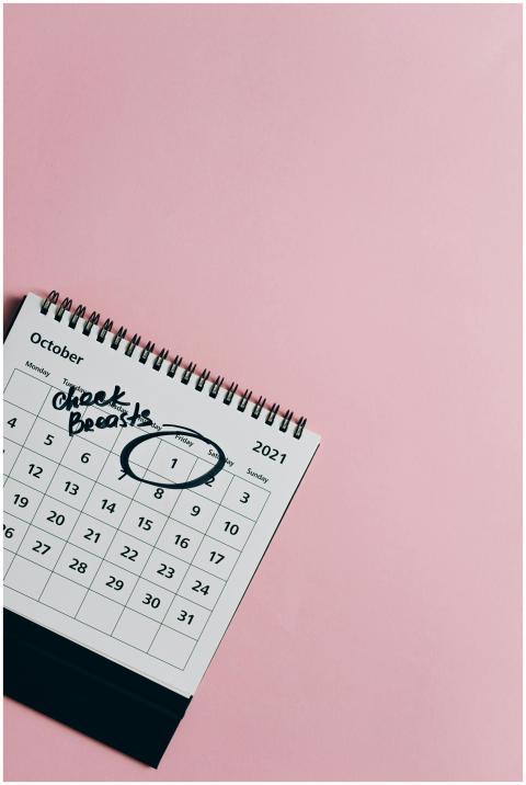 October calendar on pink background for breast can