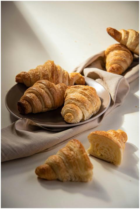 Delicious freshly baked croissants beautifully arr