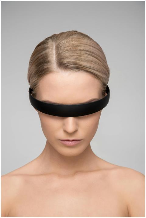 A captivating portrait of a woman with a sleek VR