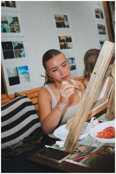 Young Woman Painting Indoor