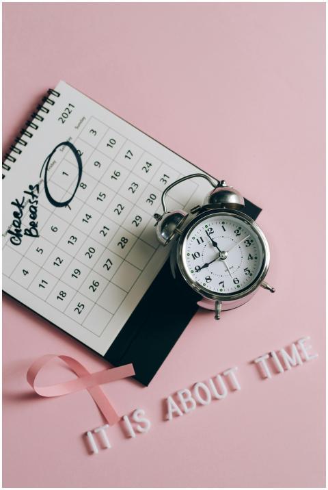 Elegant flat lay promoting breast cancer awareness