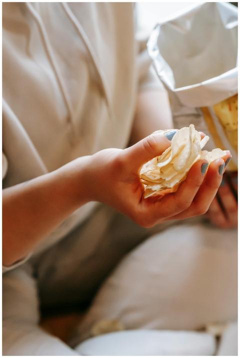 From above crop anonymous female in comfy wear dem