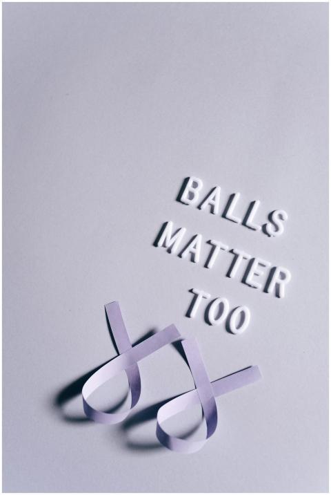 Vertical shot of a slogan 'Balls Matter Too' with