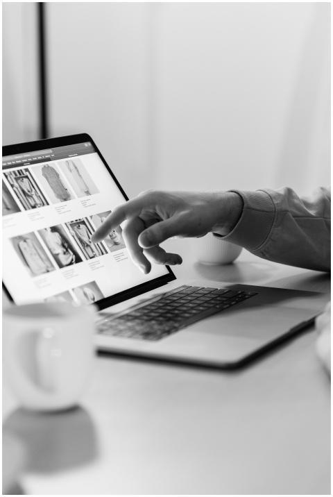 Black and white photo of a person shopping online