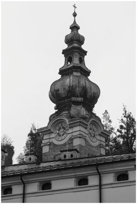 Black and white image of a historic church tower i