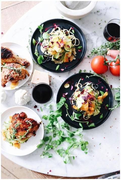 Colorful gourmet dishes with fresh vegetables and