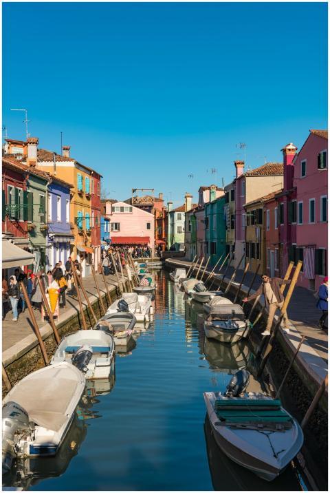 Charming canal scene with colorful buildings in Ve