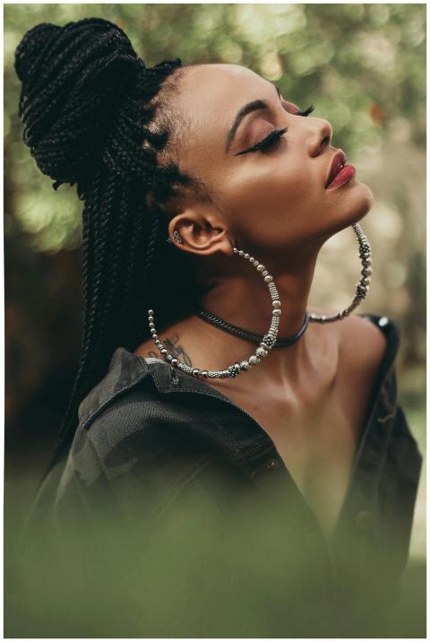 Captivating portrait of a woman with braided hair