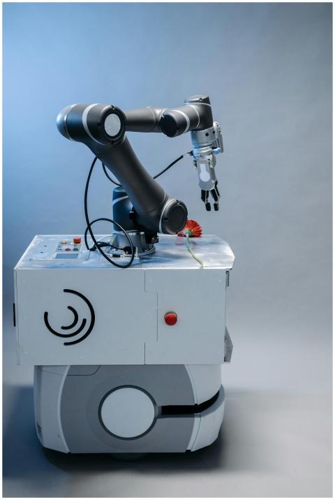 Sleek industrial robot arm in a laboratory setting