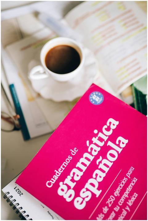 An inviting scene with Spanish grammar notebook an