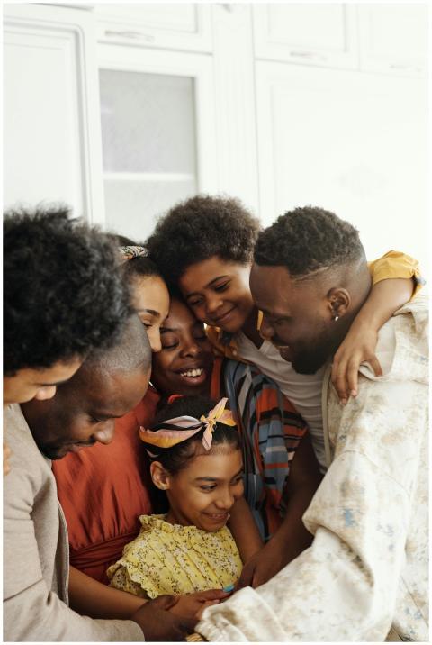 A heartwarming moment of diverse family members em