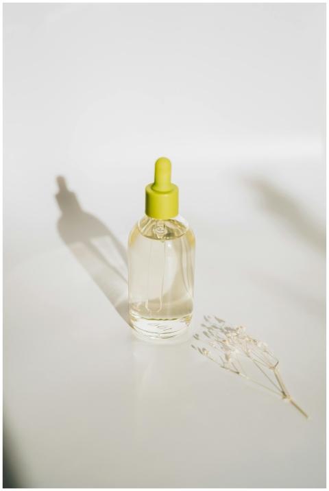Elegant minimalist shot of an essential oil bottle