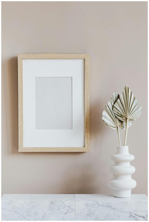 Elegant minimalist interior with a wooden frame an