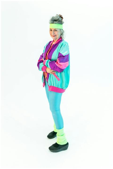 Senior woman smiling in colorful vintage aerobics