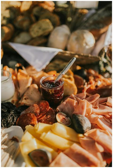 An indulgent charcuterie board featuring a variety