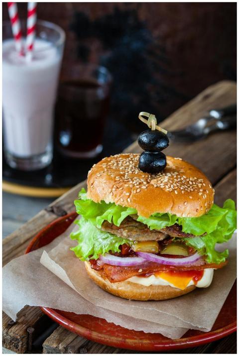 Delicious gourmet burger with fresh ingredients, i