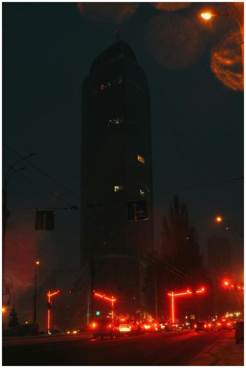 A captivating view of Kyiv at night featuring a sk