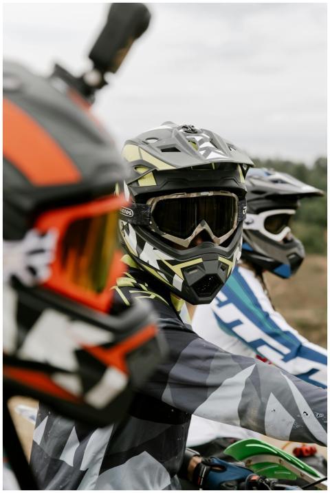 Motocross riders preparing for an extreme sports a