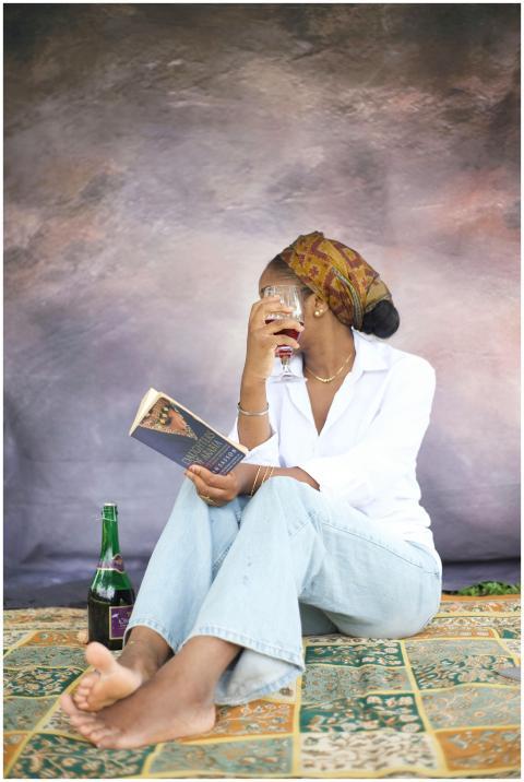 Peaceful Woman Reading And Relaxing outdoors