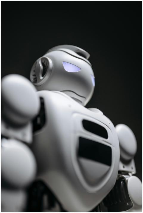 Close-up of a futuristic robot with glowing blue e