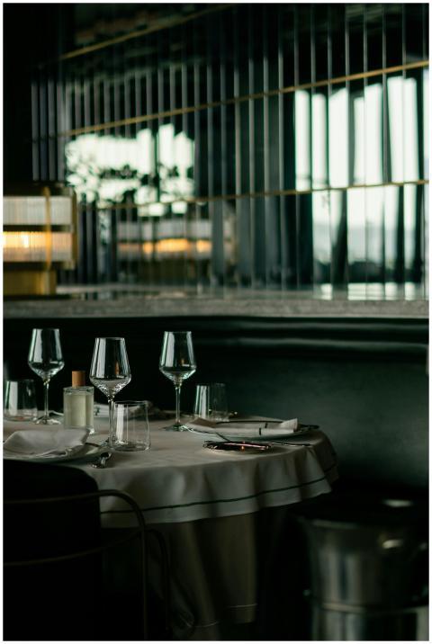 A sophisticated dining table setting in an upscale