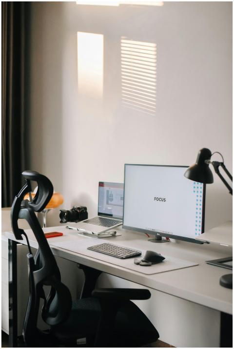 A clean and minimalist home office setup with a fo