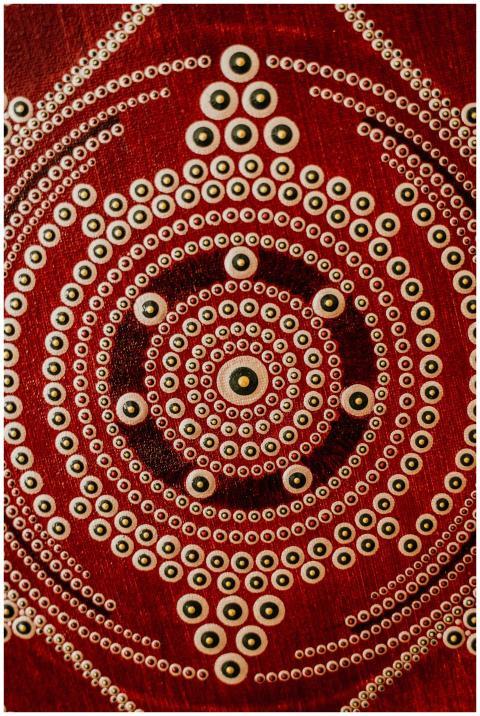 Stunning red mandala art featuring intricate geome